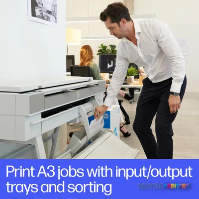 HP DesignJet T950 36-in multifunction printer with man removing printed document from output tray
