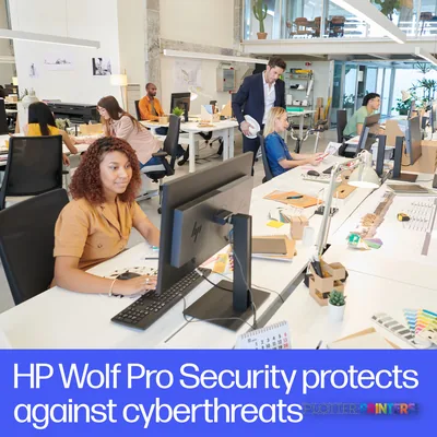 HP DesignJet T850 36-in Multifunction Printer in a busy office environment with multiple team members working at desks