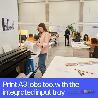 HP DesignJet T850 36-in printer with woman holding large format print in office environment