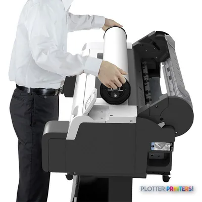 Canon imagePROGRAF TM-340 product image showing a person loading a paper roll into the printer's feed mechanism