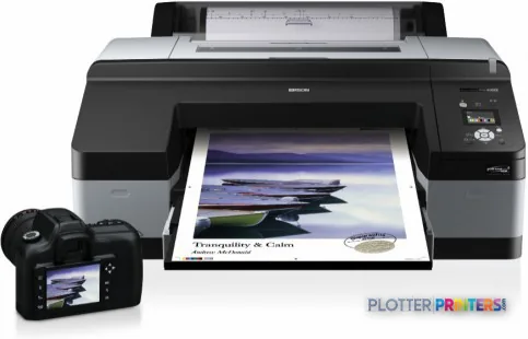 Epson Stylus Pro 4900 Designer Edition product image showing the printer with a landscape photo printing and a camera beside…