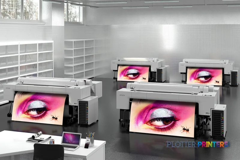 Epson SureColor P20570 lifestyle image showing multiple white large-format printers displaying vibrant color prints in a mod…