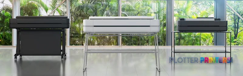 HP DesignJet T650 24-in Printer lifestyle image showing three units in black and white displayed in a bright studio with win…