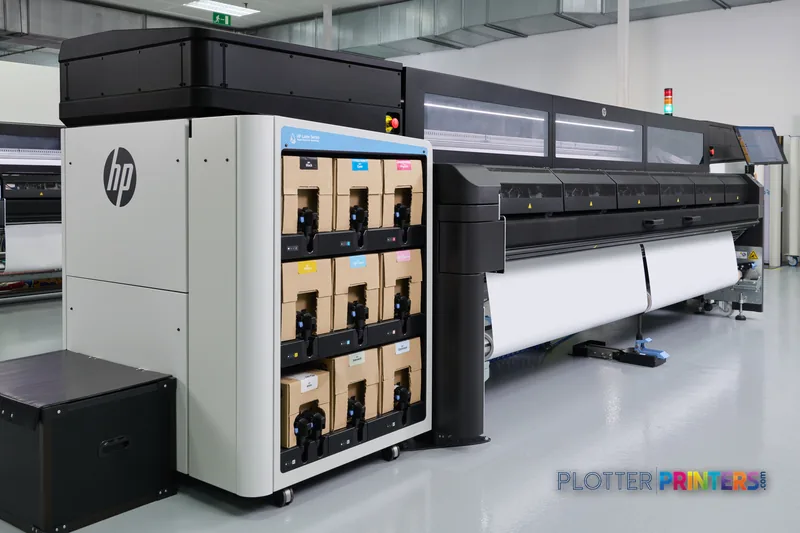 HP Latex FS60 Printer lifestyle image showing the large-format printer in a production facility with ink cartridge storage u…
