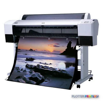 Epson Stylus Pro 9880 large-format printer product image showing the device with a coastal sunset photograph printing