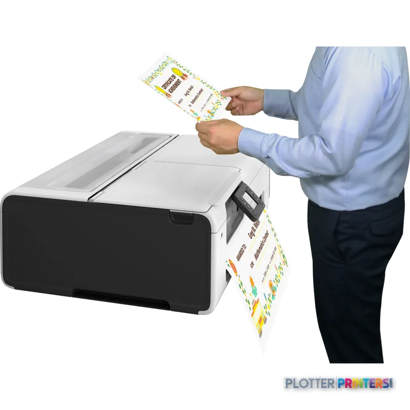 Canon imagePROGRAF TC-21M lifestyle image showing a person holding colorful printed samples from the printer