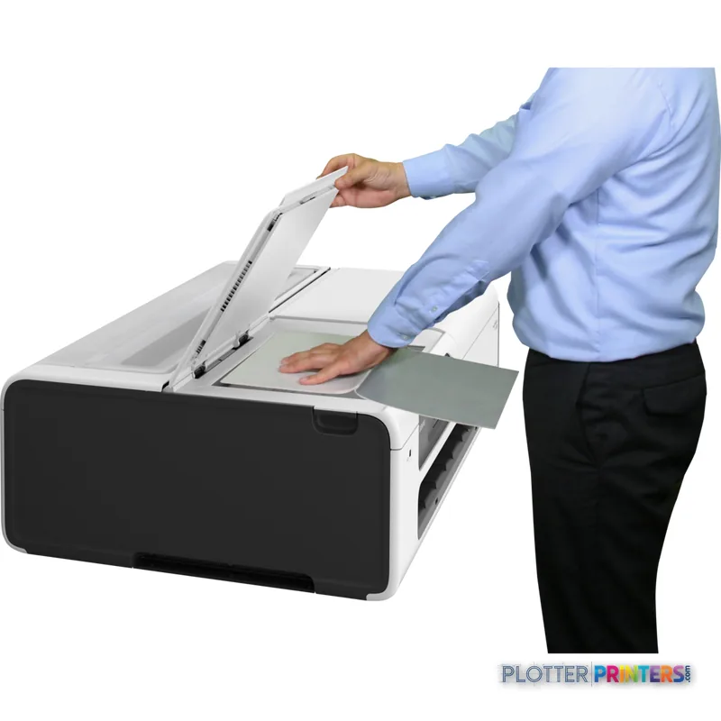 Canon imagePROGRAF TC-21M lifestyle image showing a person retrieving a printed document from the printer's output tray