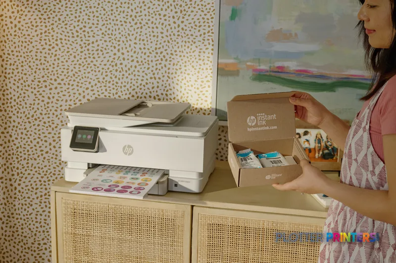 HP Latex 830 W 64-in Printer lifestyle image showing the printer on a desk with a person holding HP ink supplies nearby