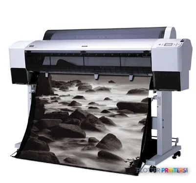 Epson Stylus Pro 9880+ large format printer product image showing white and black printer with landscape photograph printing