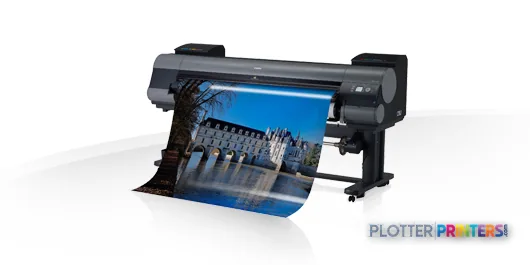 Canon imagePROGRAF iPF9400 large format printer product image showing the device with a cityscape print emerging from the ou…