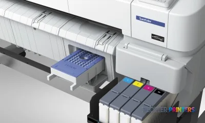 Epson SureColor SC-F6000 product image showing inkjet printer with ink cartridges and paper feed system