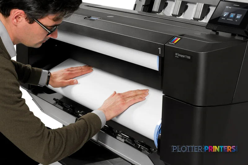 HP Designjet T1500 36-in PS ePrinter lifestyle image showing a person removing a large printed document from the printer's o…