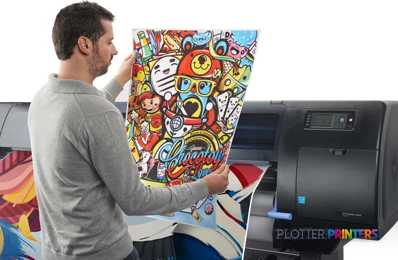 Man holding a colorful printed poster next to an HP Designjet Z6600 printer in lifestyle setting