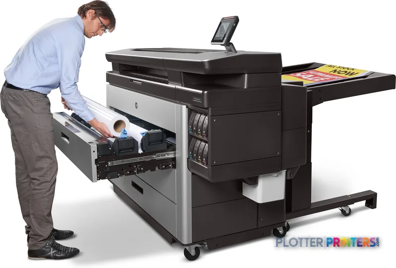 HP PageWide XL 8000 lifestyle image showing a man loading paper into the printer's front tray