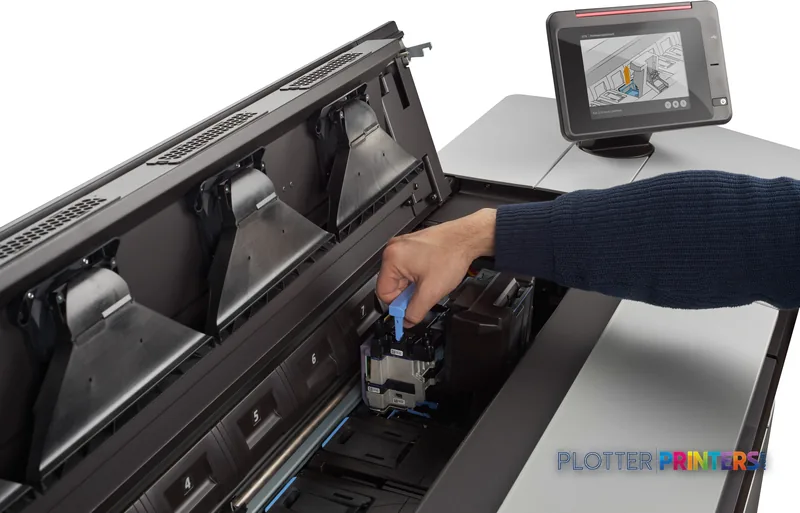 HP PageWide XL 8000 lifestyle image showing a person replacing an ink cartridge with the control panel visible