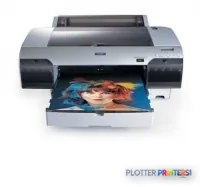 Epson Stylus Pro 4000-C8 large-format printer with open tray showing a vibrant color photo print