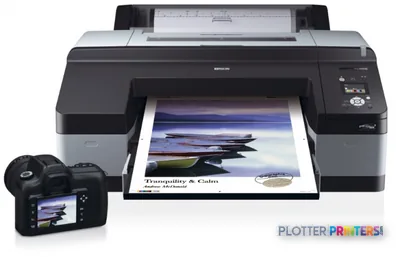Epson Stylus Pro 4900 Spectro M1 large-format printer with printed landscape photo output and camera