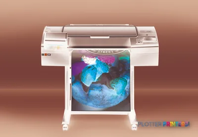 HP Designjet Z2600 24-in PostScript large format printer product image showing white printer with colorful globe print output