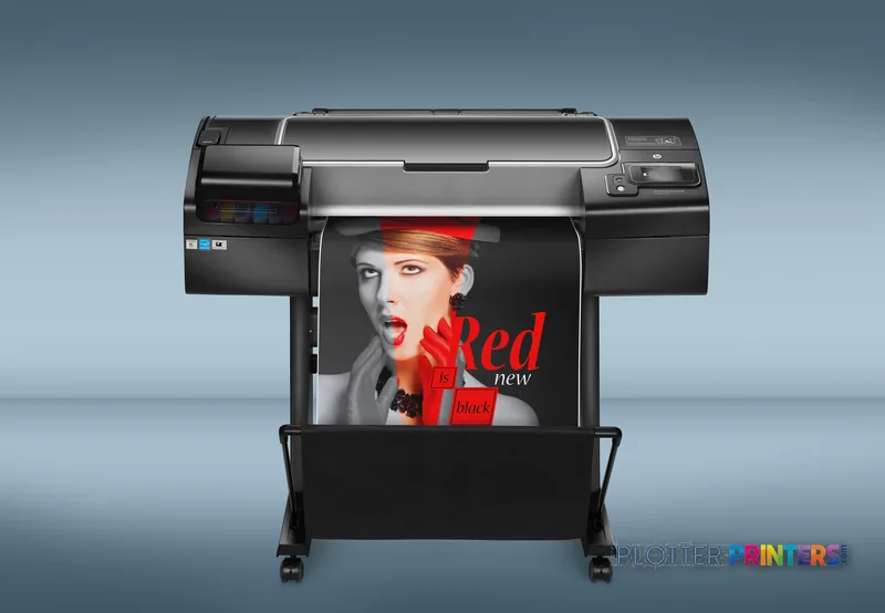 HP Designjet Z2600 24-in PostScript large format printer lifestyle image showing the black printer with a color portrait pri…