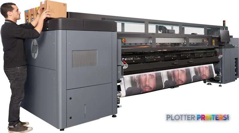 HP Latex 3600 Printer lifestyle image showing operator loading media into the large-format printer