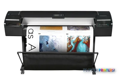 HP Designjet Z5200 large-format printer product image showing the device with sample color prints of landscapes and textures…