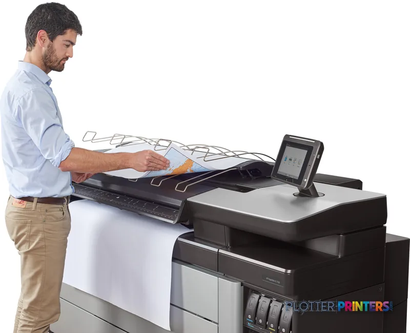 Man examining a large color print from HP PageWide XL 5100 printer in lifestyle setting