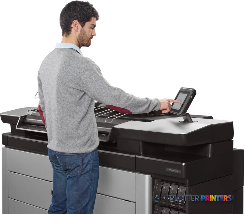 Man operating HP PageWide XL 5100 large format printer via touchscreen in lifestyle setting