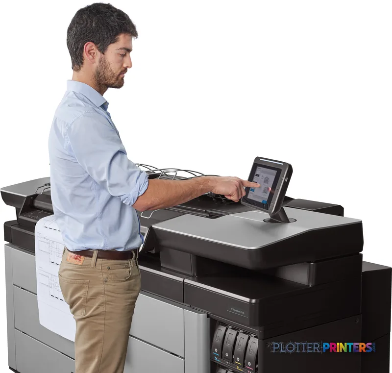 Man operating HP PageWide XL 5100 large format printer via touchscreen control panel in office setting