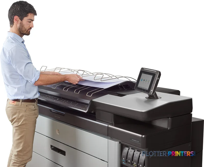 Man using HP PageWide XL 5100 printer lifestyle image, holding large format output with touchscreen visible