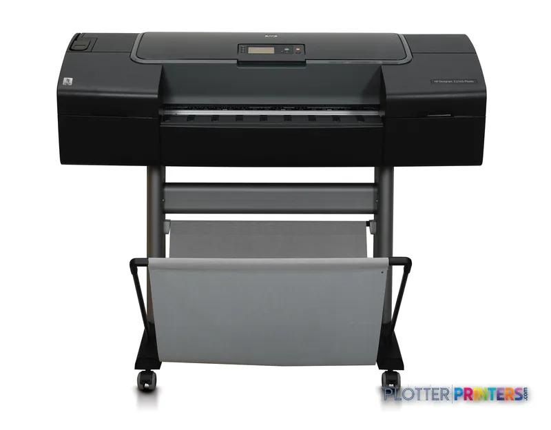HP DesignJet Z2100 24 in photo printer on stand, front view showing black printer body with control panel and gray output tr…
