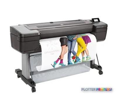 HP DesignJet Z9+ 44-in PostScript Printer front-right view with black and grey body printing colorful fashion imagery