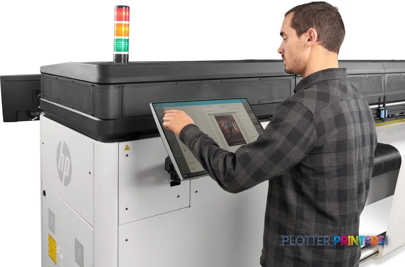 HP Latex R1000 Plus Printer lifestyle image showing operator using touchscreen control panel