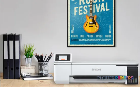 Epson SureColor SC-T3100x large-format printer on desk displaying a blue music festival poster