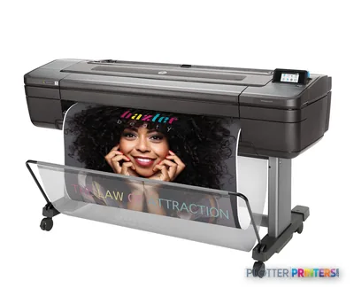 HP DesignJet Z9+dr 44-in PostScript Printer front-left view showing black and silver printer with colorful output sample