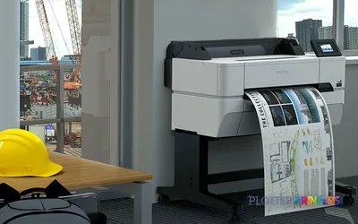 Epson SureColor SC-T3405 large format printer in white and black, shown printing a technical drawing in an office setting