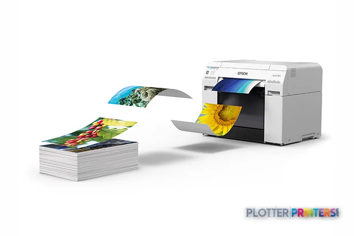 Epson SureLab D870 product image showing white inkjet printer with output tray dispensing color photo prints