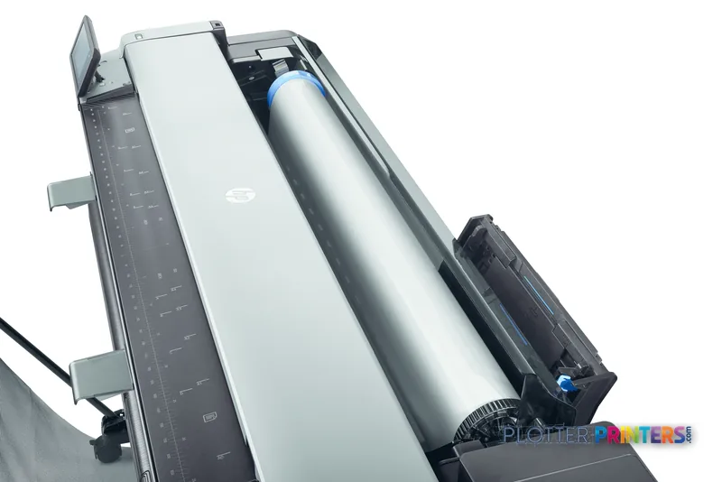 HP DesignJet T830 24-in multifunction printer detail view showing open top access with roll media loaded