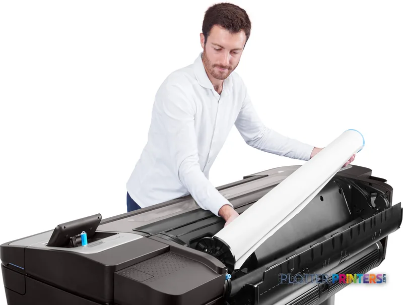 Man unrolling printed paper from HP DesignJet T1700dr 44-in PostScript Printer in lifestyle setting