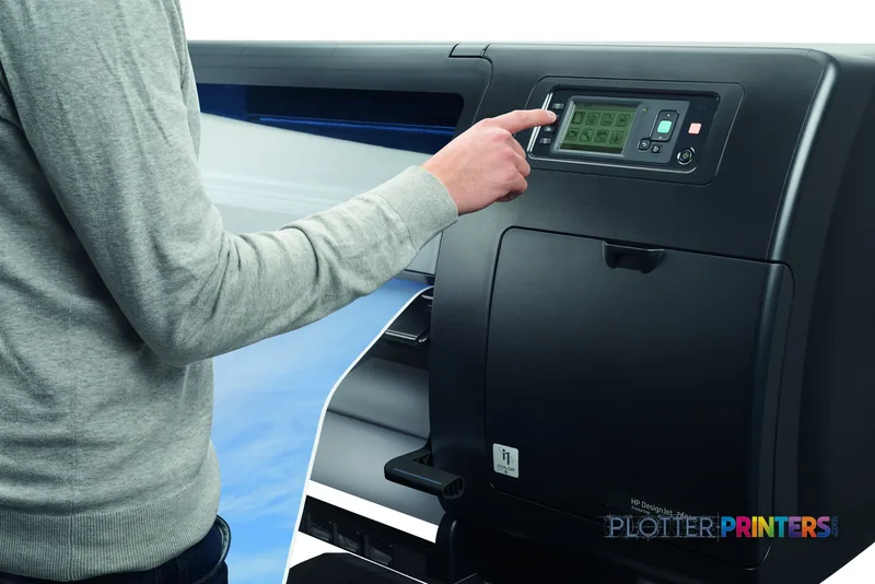 Person operating the control panel of an HP DesignJet Z6810 42-in Production Printer in a lifestyle setting