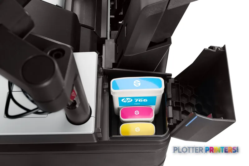 HP DesignJet XL 3600dr 36-in printer ink cartridge compartment showing stacked cyan, magenta, and yellow cartridges