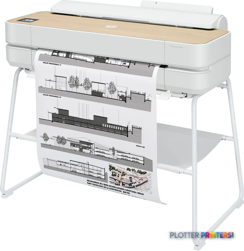 HP DesignJet Studio 24-in Printer product image showing white printer with wood top surface and architectural drawings displ…