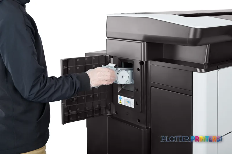HP PageWide XL 8200 lifestyle image showing a person opening the ink cartridge access panel on the black and white printer