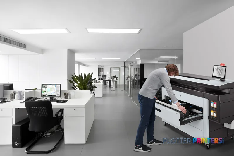 HP PageWide XL 8200 40-in Printer lifestyle image showing operator using the black and white printer in a modern office envi…