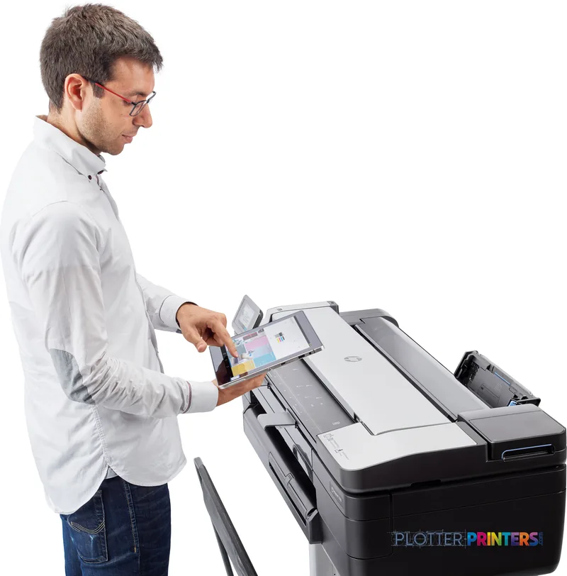 Man using touchscreen on HP DesignJet T830 36-in Multifunction Printer in lifestyle setting