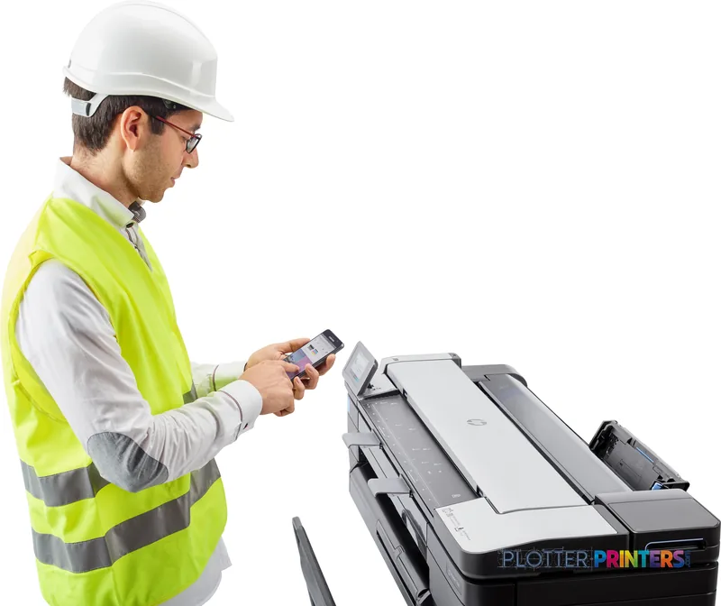 Construction worker in safety gear using mobile device with HP DesignJet T830 36-in printer in lifestyle setting