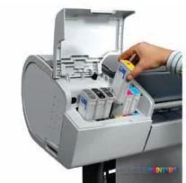 HP Designjet T790 44" large format printer with open ink cartridge compartment showing color ink cartridges