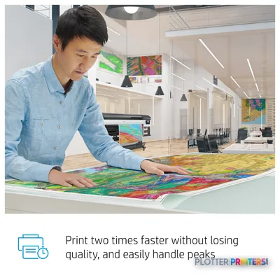 HP DesignJet Z6 Pro 64-in Printer in office setting with user examining colorful large-format print output