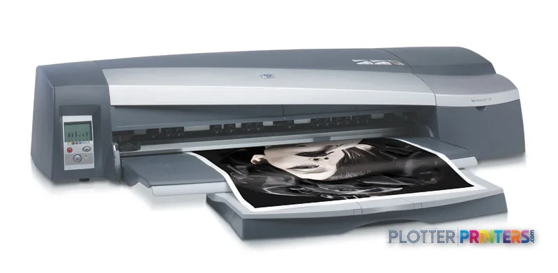 HP Designjet 130 large format printer product image showing the device with an open output tray displaying a printed black a…